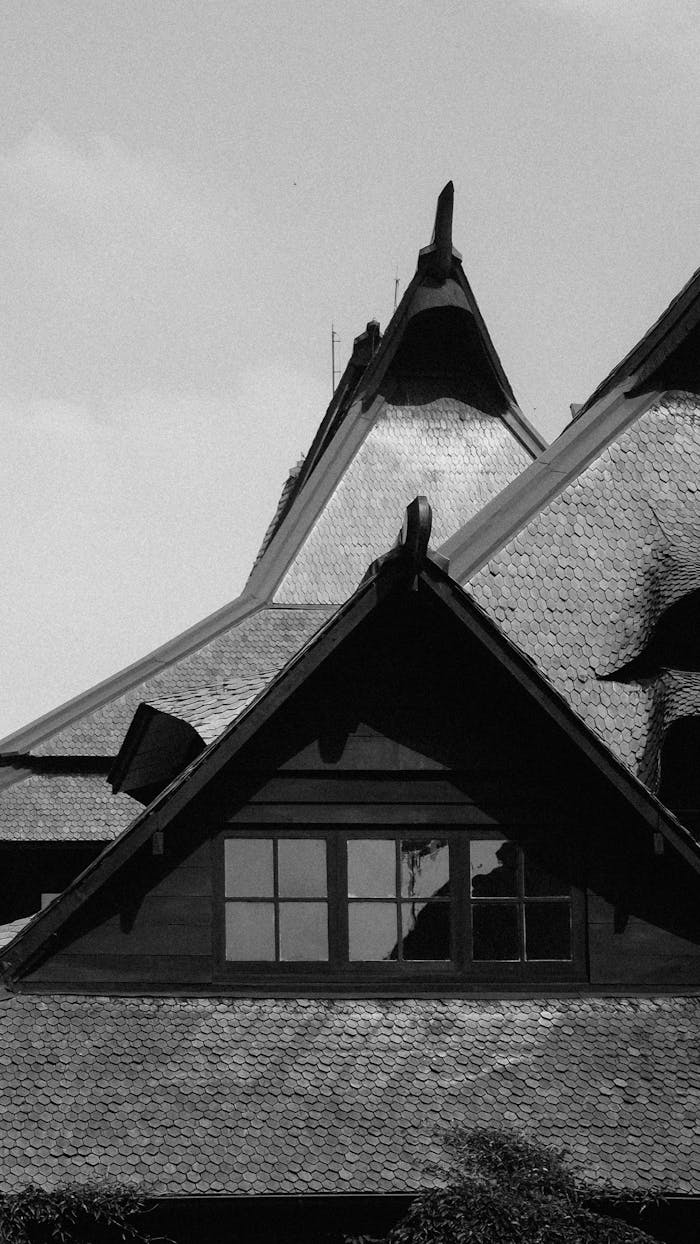 Black and white shot of traditional West Javanese building in Bandung, capturing unique architectural design.